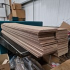 Cut sheet board strips ready for packing